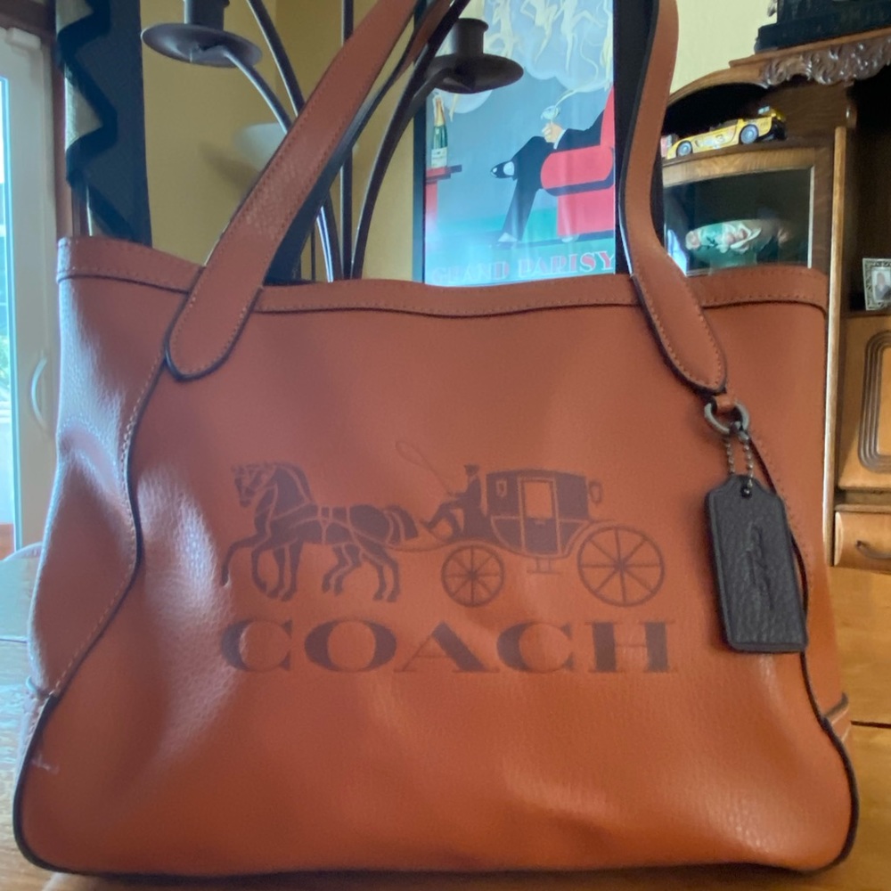 Coach bucket bag with vintage logo.